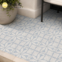 Mosaïque de marbre blanc Thassos à motif floral bleu accrocheur, design carré découpé au jet d'eau pour la décoration murale moderne des cuisines et salles de bain