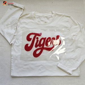 งานออกแบบลายเสือแบบกำหนดเอง ตัวอักษรขนฟู ตัดด้วยเลเซอร์ แบบพัฟฟ์  แบบรีดร้อน  แบบ DTF  ขายส่งสำหรับเสื้อผ้าและเสื้อยืด - Product Image 6