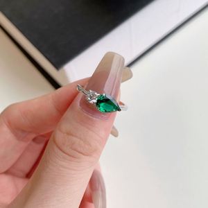 Dylam Top End Collection Rhodium Plated 925 Sterling <b>Silver</b> Diamond Sparkling Tear Oval <b>Emerald</b> Two Stone 5A Zirconia <b>Ring</b> - Product Image 6