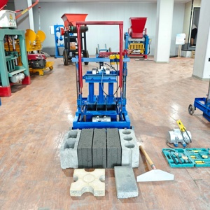 Fabricante de ladrillos móvil <span class=keywords><strong>manual</strong></span> con sistema de mezcla | Máquina de bloques de puesta de huevos movible para ladrillos de cemento y hormigón - Product Image 2