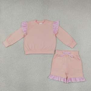 เสื้อสเวตเชิ้ตสีพื้นแบบสบายๆ สำหรับเด็กผู้หญิง พร้อมกางเกงขาสั้นระบายขอบ ชุดเซ็ต 2 ชิ้น ขายส่ง ชุดเสื้อผ้าเด็กผู้หญิงสำหรับพี่น้อง - Product Image 4