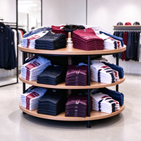 Portant à vêtements pour magasin, noir, avec poteaux à fentes, étagère en bois, rail de suspension, table de présentation ronde, CE ETL, vente en gros