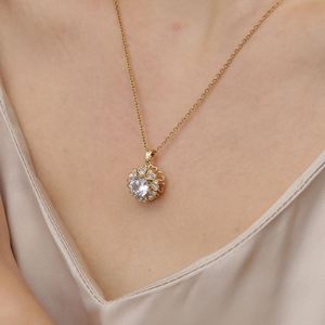 Hot Selling Stainless Steel <b>Chain</b> Necklace <b>Copper</b> Plated Shiny Zircon Flower Rotating Spinning Clover Pendant Necklace - Product Image 4