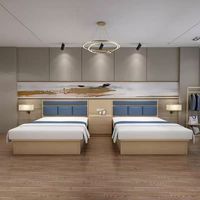 Ensemble de meubles de chambre à coucher : Lits jumeaux, lit plateforme en bois avec tête de lit capitonnée bleue et tables de chevet