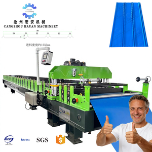 เครื่องขึ้นรูปเหล็กแผ่นทรงสี่เหลี่ยมคางหมู ยี่ห้อ Hauan Machinery ขนาดความกว้างป้อนวัสดุ 1250 มม. ความหนา 0.8-2.0 มม. สำหรับทำกระเบื้องเหล็กเคลือบสีสำหรับหลังคา - Product Image 1