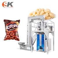 Machine d'emballage verticale automatique multi-têtes pour snacks, biscuits, noix, cacahuètes, sachets de granulés multifonctions