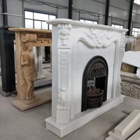 Cheminée en marbre blanc sculpté avec insert en fonte, style classique européen, cadre de cheminée en pierre polie