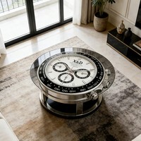 La table basse au design moderne avec une base en métal doré et un dessus en verre transparent est un ajout idéal