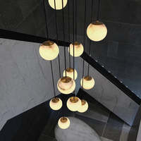 Projet de lumière d'albâtre d'escalier de concepteur Indoor Hotel Lobby Villa Lustres en laiton de lustres de mable naturel
