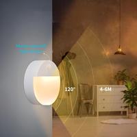 Lampu samping tempat tidur induksi dioperasikan baterai AAA lampu induksi dinding induktif bundar lampu malam