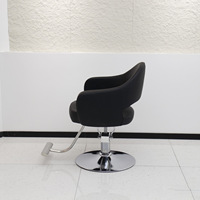 Nouveau fauteuil de barbier vintage en cuir avec accoudoirs pivotants et réglables pour salon de coiffure, zone de permanente et de coloration