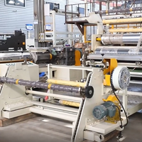 Machine de revêtement adhésif en caoutchouc butyle entièrement automatique avec extrudeuse pour membranes EPDM et ruban en aluminium