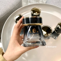 OEM ODM Personnalisé Luxe 100ml 120ml Huile Cosmétique Crème Soin de la Peau Soins Personnels avec Bouteille en Verre Rond Blanc Or Noir