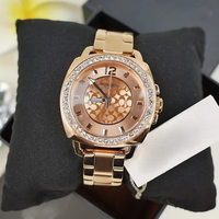 Montre pour femme en strass, boîtier coussin or rose, lunette en cristal, cadran floral, chic, élégante, stylée, à quartz, cadeau, résistante à l'eau