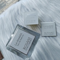 Modèle d'étiquette de produit bouteille parfum étiquette autocollant impression de logo transfert de logo personnalisé autocollants en métal de parfum de carte en relief