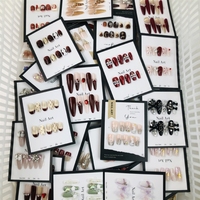 Boîtes mystères de faux ongles œil de chat faits main uniques et variés, vente en gros pour usage quotidien, diffusion en direct et vente en kiosque nocturne