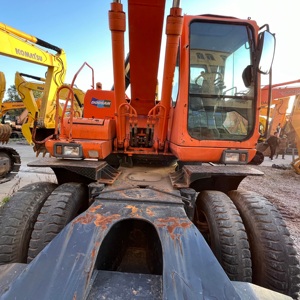 Excavatrice sur pneus d'occasion Doosan DH210W-7, peinture d'origine, bon état et prix bas, excavatrice sur pneus de 21 tonnes, prête à être expédiée - Product Image 3