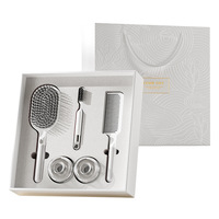 Nouvelle collection 2026 : Coffret cadeau de luxe léger avec peigne à air en ABS, thème Fête des Dames, idéal pour les cadeaux d'entreprise et les fêtes.