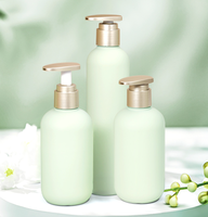 Juego de plástico cosmético HDPE con tapa abatible verde, limpiador Facial, botella vacía, bomba de loción de ducha, botella 200/260/300/400/500ml