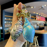Pendentif porte-clés coquillage délicieusement adorable plaqué coloré parfait pour les sacs et accessoires de voiture pour femmes