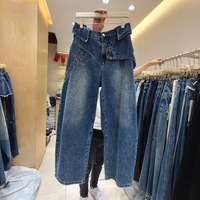 Nouvelle collection automne 2026 – Jean déstructuré coupe droite et large, bleu délavé, style rétro américain, longueur ras du sol, chic et décontracté pour femme – Vente en gros