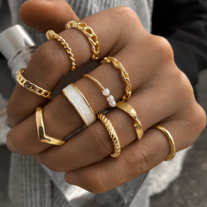 Gran oferta de anillos de joyería para mujer, anillo de perla torcida hueca de Metal, 10 juegos de anillo femenino Simple para mujer