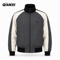Blouson universitaire pour homme gris anthracite à manches raglan, avec broderies personnalisées, style décontracté vintage, veste bomber de baseball, vente en gros