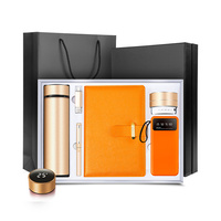 Ensemble cadeau de haute qualité comprenant un stylo, une clé USB, un carnet et une batterie externe, idéal pour les cadeaux d'affaires et promotionnels