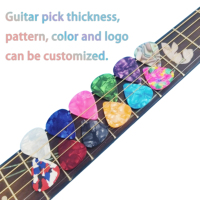 Vente en gros de celluloïd bon marché 0.46-0.71- 0.96mm. Fabriqué en matériau celluloïd en plastique celluloïd médiators pour guitare Plectre durable et lisse