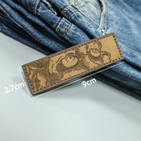Fabricant d'étiquettes en cuir Patch en PU gaufré et cousu Chaussures et chaussettes en relief 3D Patch noir Logo en cuir