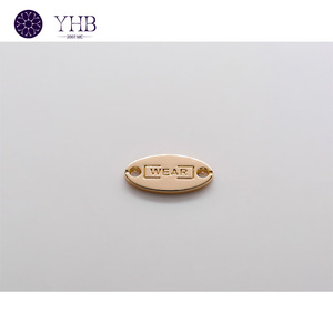 ปุ่มเย็บโลหะป้ายโลโก้อุปกรณ์เสริมสำหรับเสื้อผ้ามี2รูทรงวงรี - Product Image 6
