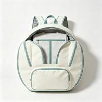 Sac à dos de tennis rond crème menthe, sac double pour raquettes avec deux poches avant pour raquettes, poche centrale zippée, bretelles rembourrées