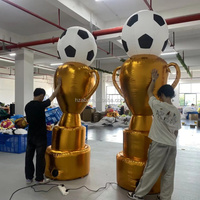 Trophée gonflable géant avec coupe de championnat de football ou de soccer pour la publicité sur le thème du sport et autres événements