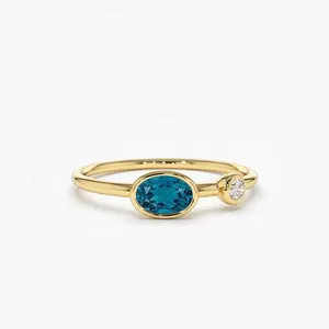 LYBURCHI 925 Sterling Silver 14/18K Gold Plated Vermeil Fine Jewelry Oval Blue Topaz and CZ Diamond Gemstone Ring for Women