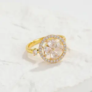 Groothandel Trendy Koperen Vierbladige Windmolen Draaibare Ring Goud Universeel Wiel Wit Opening Decompressie Vinger Ring