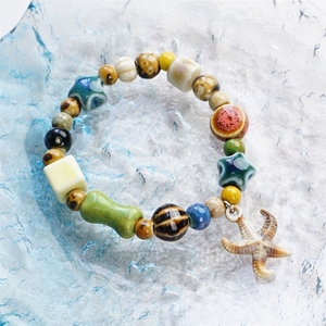 Bracelet extensible en céramique perlée, style nautique côtier, avec breloque étoile de mer et coquillage naturel faits à la main, souvenir touristique bohème de bord de mer, vente en gros - Product Image 2
