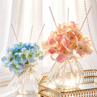 Diffuseur de parfum de luxe en verre en forme de citrouille avec fleur artificielle d'hortensia pour l'aromathérapie, idéal pour les mariages, les fêtes et la décoration intérieure
