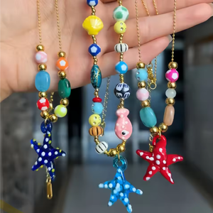 Nouveau collier en perles <span class=keywords><strong>de</strong></span> verre en forme d'étoile <span class=keywords><strong>de</strong></span> mer et <span class=keywords><strong>de</strong></span> perles mélangées, collier <span class=keywords><strong>de</strong></span> plage en coquillages marins, perles <span class=keywords><strong>de</strong></span> graines d'été, grand collier en forme d'étoile <span class=keywords><strong>de</strong></span> mer, collier en forme d'hippocampe - Product Image 1