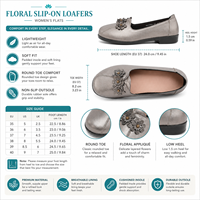 Mocassins chics en cuir noir à enfiler avec ornement floral 3D superposé, étoile dorée et semelle compensée zigzag pour femme