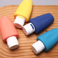 Nuevo Color personalizado plegable Squeeze cosmético 100ML silicona loción champú botella viaje botella conjunto