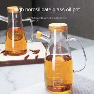 Pichet en <span class=keywords><strong>verre</strong></span> borosilicaté 1000ML <span class=keywords><strong>avec</strong></span> couvercle en bambou <span class=keywords><strong>Carafe</strong></span> à <span class=keywords><strong>eau</strong></span> ronde ambre <span class=keywords><strong>avec</strong></span> poignée et bec pour boisson à l'huile maison - Product Image 2