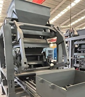 Machine de fabrication de blocs de béton hydraulique QT4-15 automatique bon marché Machine de fabrication de briques de ciment