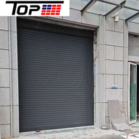 Porte à enroulement isolée en aluminium avec rupture de pont thermique pour économie d'énergie, idéale pour garage et atelier