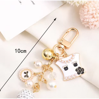 Porte-clés vintage élégant pour fille, sac à main avec pendentif en métal pour casque, sac à main pour écouteurs, accessoires, cadeau