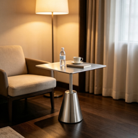 Table d'appoint carrée moderne en acier inoxydable avec base conique polie, design minimaliste pour salon