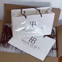 Sac en papier d'emballage pour vêtements, chaussures, bijoux, cadeaux, avec logo personnalisé imprimé, rose bonbon de luxe