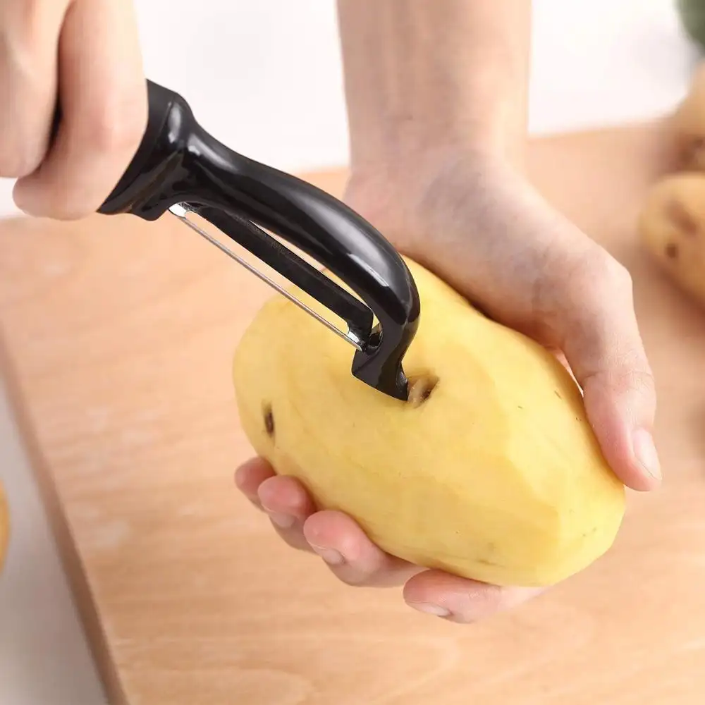 Großhandel Küche Obsts chäler Edelstahl Dreh klinge Kartoffel schäler mit weichem Griff