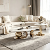 Ensemble de table basse italienne moderne, base sphérique, table d'appoint ovale pour salons, décoration de luxe pour l'intérieur des maisons haut de gamme.