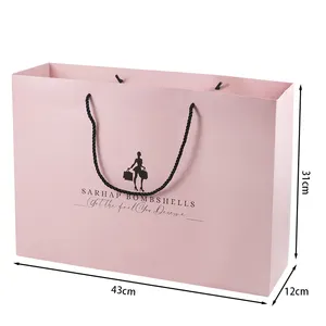 Custom Luxury Pink Clothes Store Retail Packaging Gift Carry Bags Boutique Shopping Paper Bags With Your Own Logo