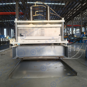 เครื่องขึ้นรูปแผงประตูเหล็กอัตโนมัติ เครื่องขึ้นรูปแผงประตูเหล็กสำหรับอุตสาหกรรม เครื่องรีดขึ้นรูปแผงประตูเหล็ก - Product Image 5